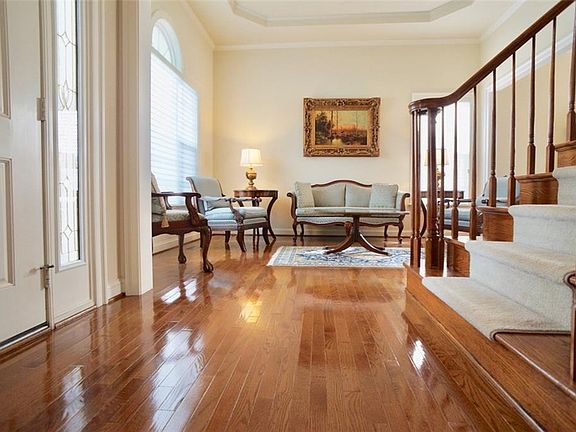 Beautiful hardwood flooring downstairs and like-new cream carpet upstairs.