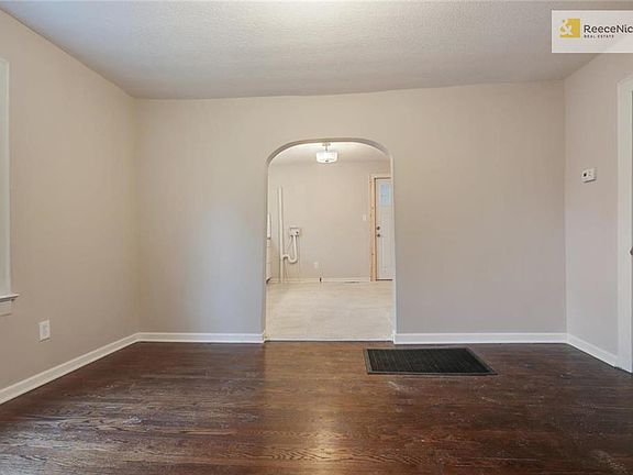 Living room leads to kitchen