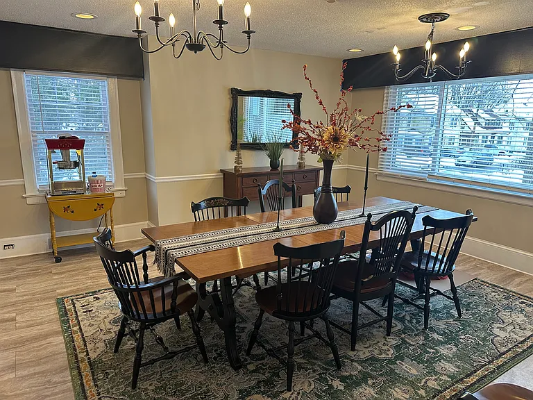 large decorated dining room with popcorn machine!