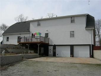STEEL SIDING ACROSS BACK OF HOME