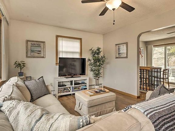 Welcome home! View from the front door into living room and kitchen.