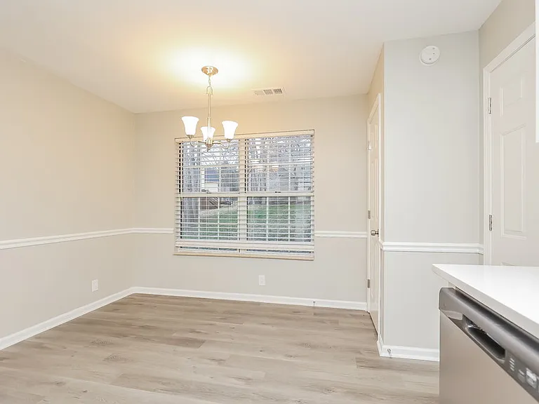 1409 Woodchimes Ct — Photo 6