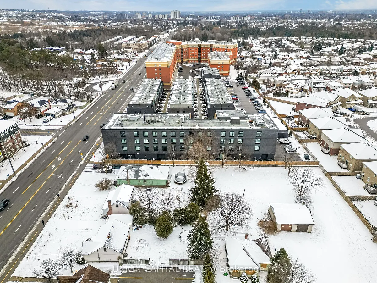 Building Photo - 1800 Simcoe St N #201