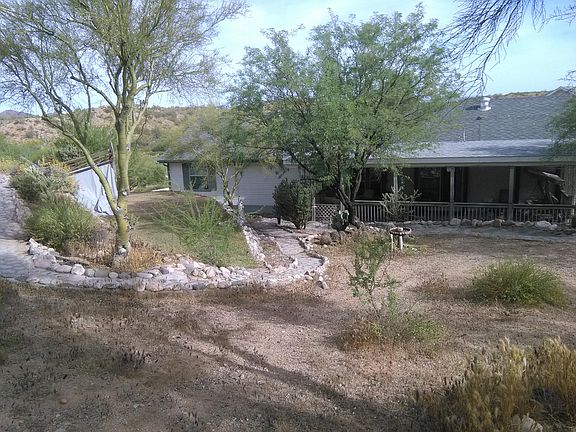 Back yard w/ covered deck