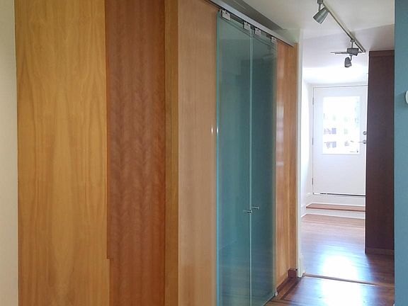 Glassdoor closet and storage- Hall to rear deck