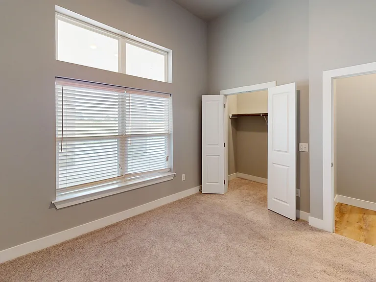 The Bellview's bedroom also features a double-door closet. The Bellview's bedroom also features a double-door closet.