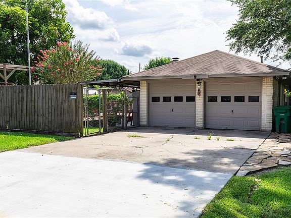 2 Car Attached Garage with Newer Driveway.