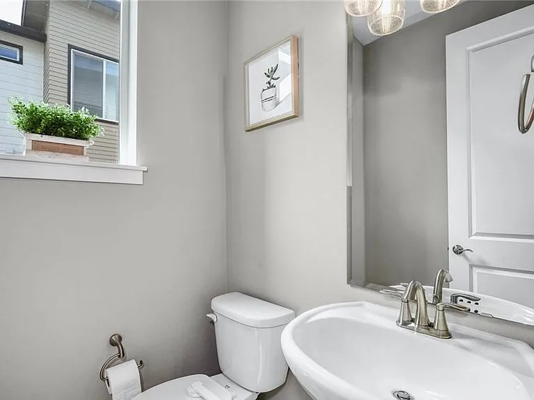 Main floor powder room for you and your guests. (Bathrooms on each level)