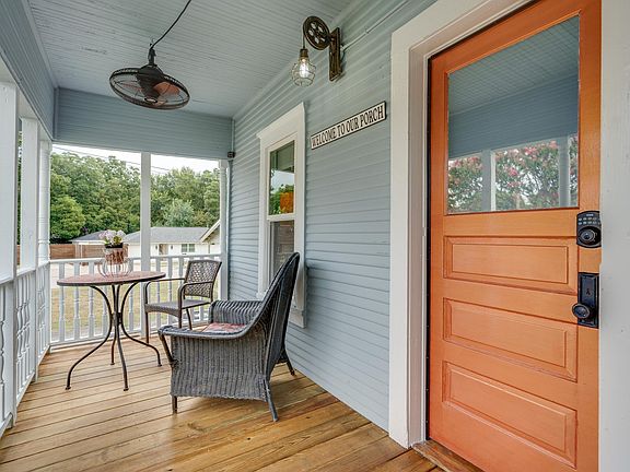 Our rebuilt front porch offers peaceful sitting areas for morning or evening coffee/tea or book reading.
