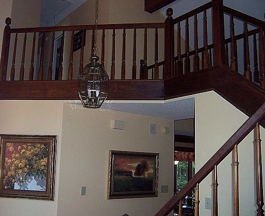 stairs overlook den & foyer