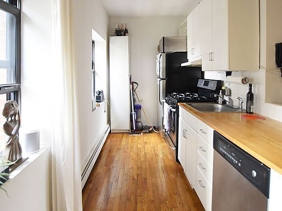 3rd image of 111 E 12th St APT 3F