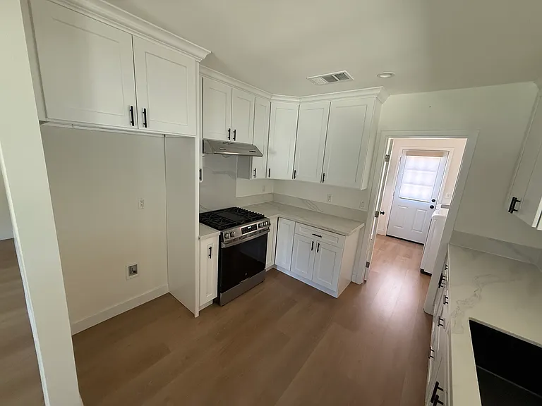 kitchen (new fridge will be installed prior to move in)