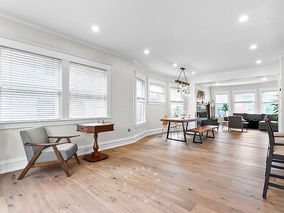 Living room with new oak hardwood floors and millwork