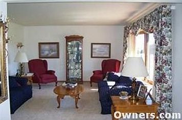 Bay window and new carpet in front room