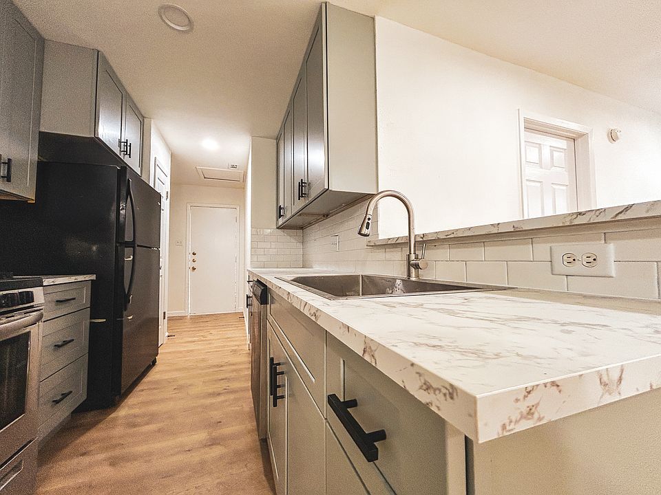Fully upgraded kitchen with modern finishes and plenty of space.