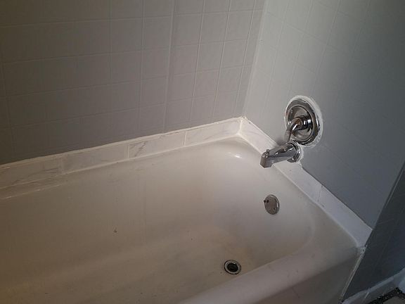 Ceramic lined marble tile framework