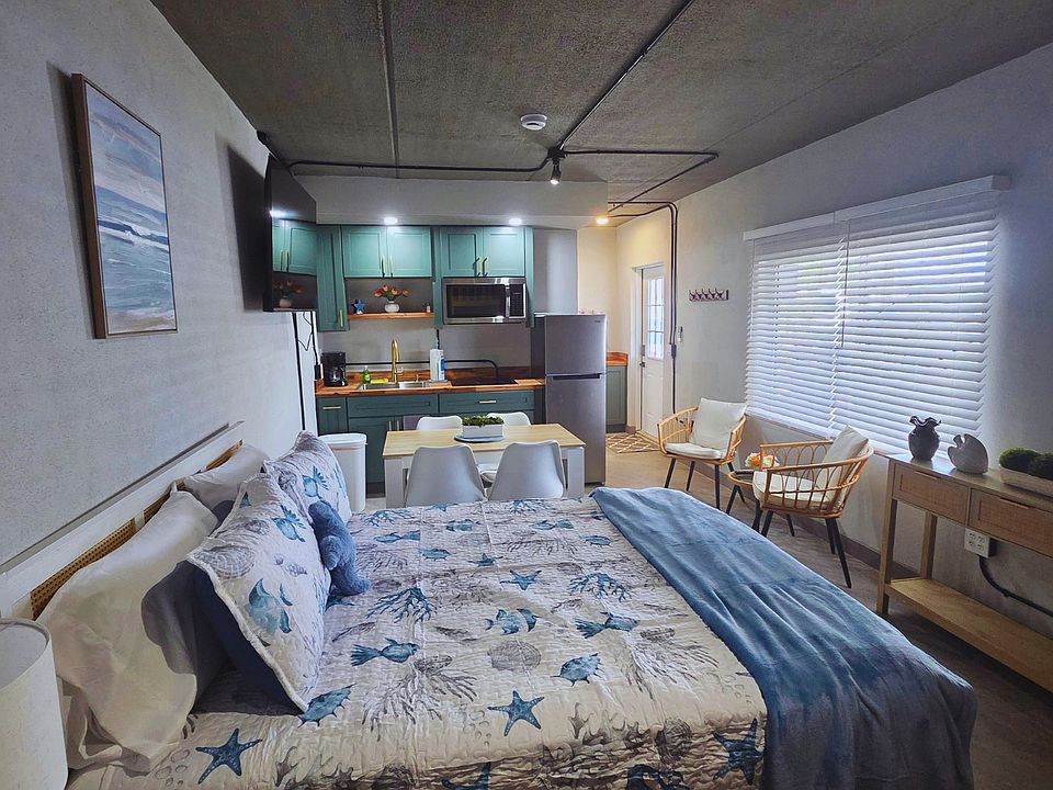 The perfect seaside retreat with cozy seating and a fully equipped interior.
