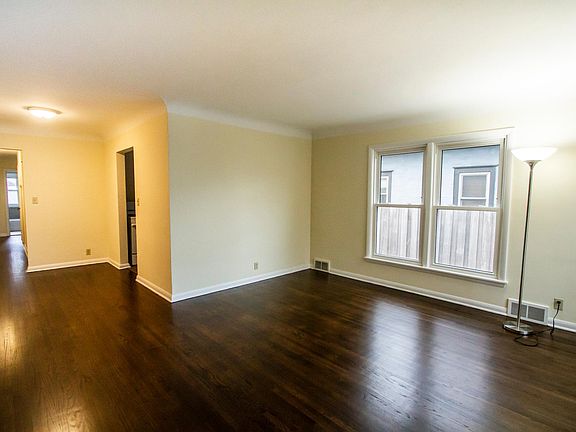 Living room/dining room with beautiful hardwood floors