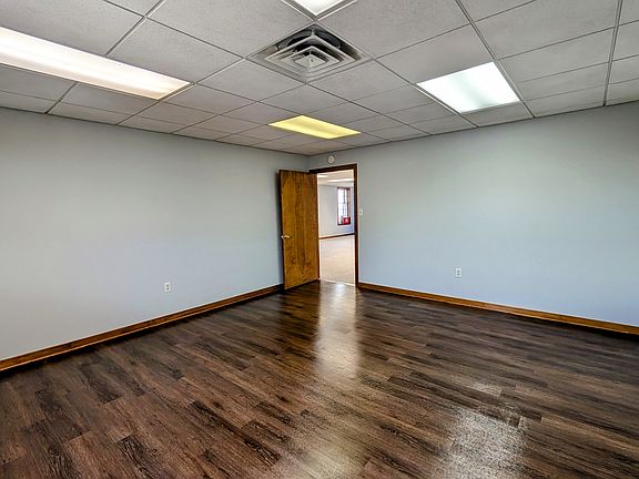 Fresh new flooring to compliment the oak trim. 2nd bedroom with 1 window