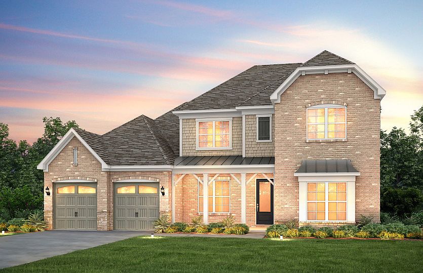 Woodfield Exterior 8 features brick, shakes, stone and covered front porch