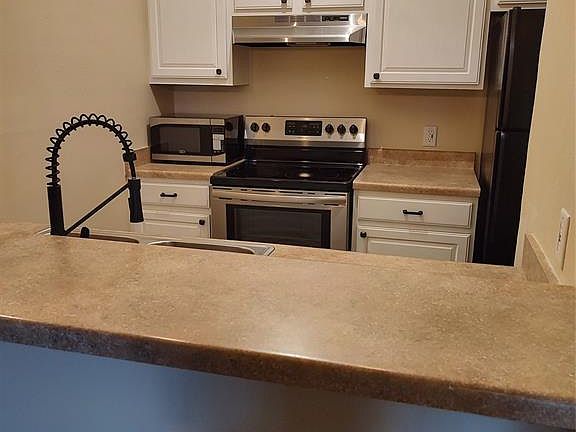 5th image of 7011 N Holiday Dr