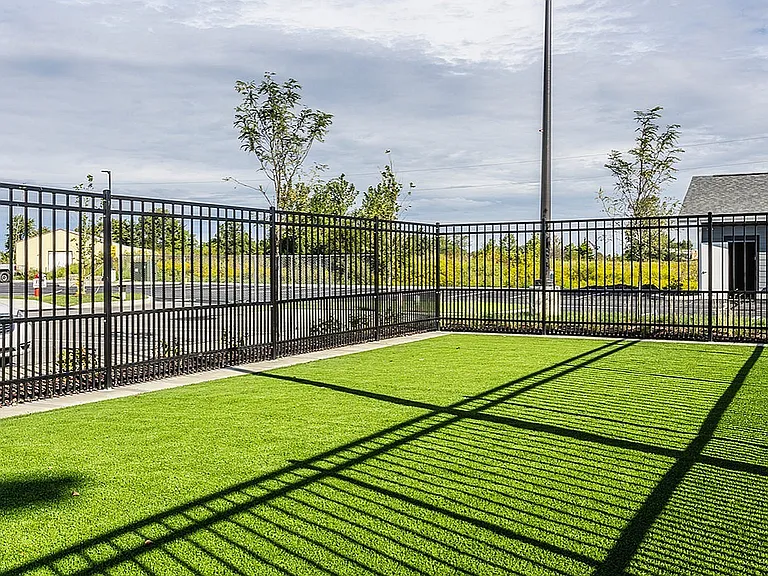Nese's pet-friendly amenities include a fenced-in dog park.