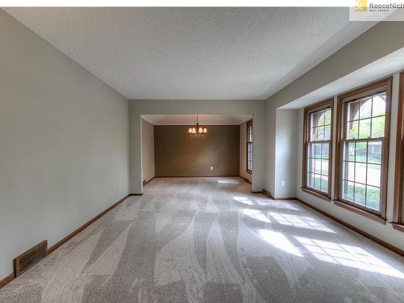 Formal living room opens to the dining room