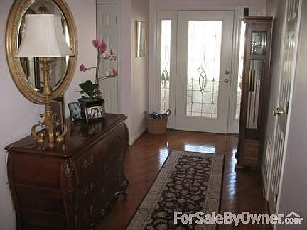 FOYER : Foyer w/Hardwood Flooring; Coat Closet; Leaded Glass Front Door w/Sidelites