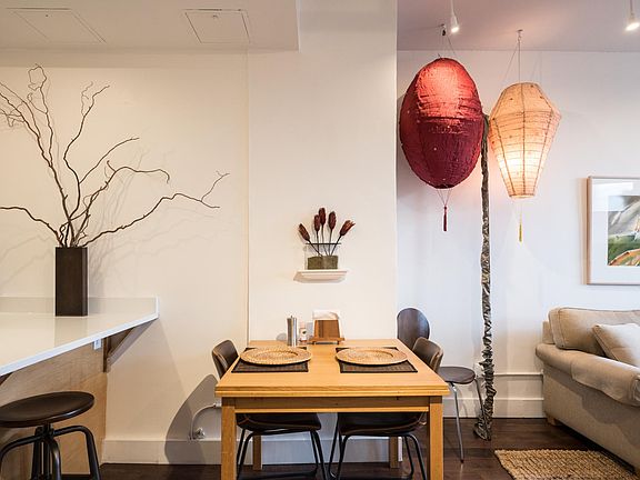 Dining table that expands to twice this size. Current tenants are using this as a two person work station.