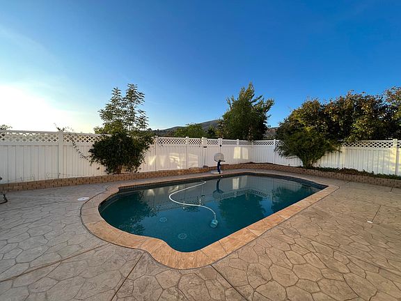 Beautiful backyard with pool and good view