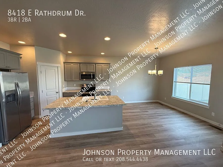 2nd living room area above garage in this 5 year old North Nampa single family! Make it your home! — Photo 3