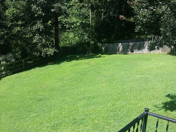 Large, private fenced back yard