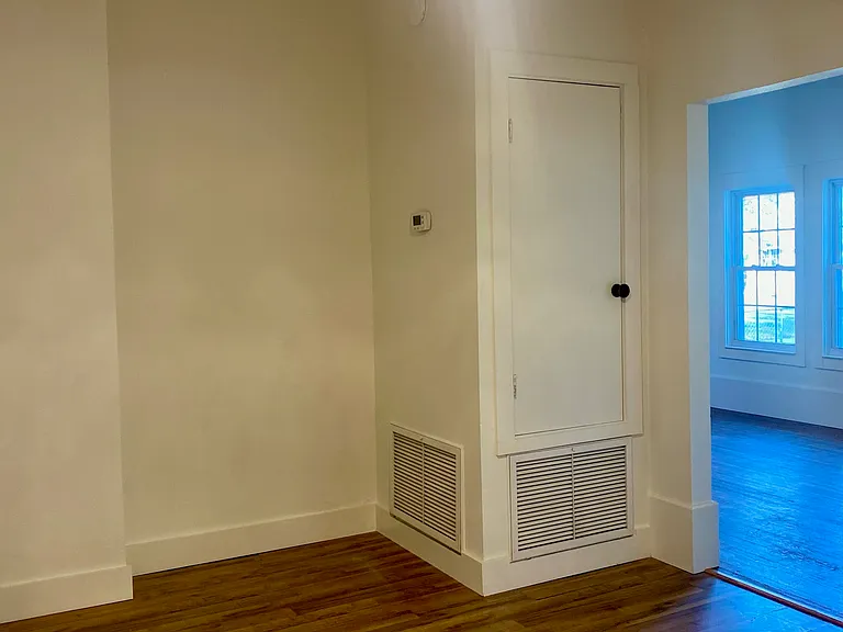 Dining area with entrance to the living room (pictured) and entrance to the main hallway