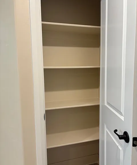 Master bathroom linen closet