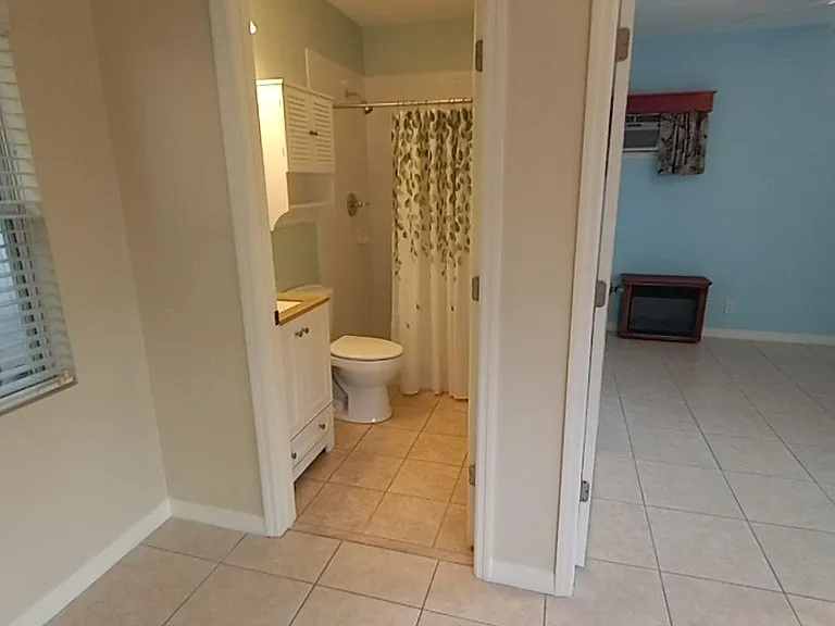 South view into Bathroom and Bedroom