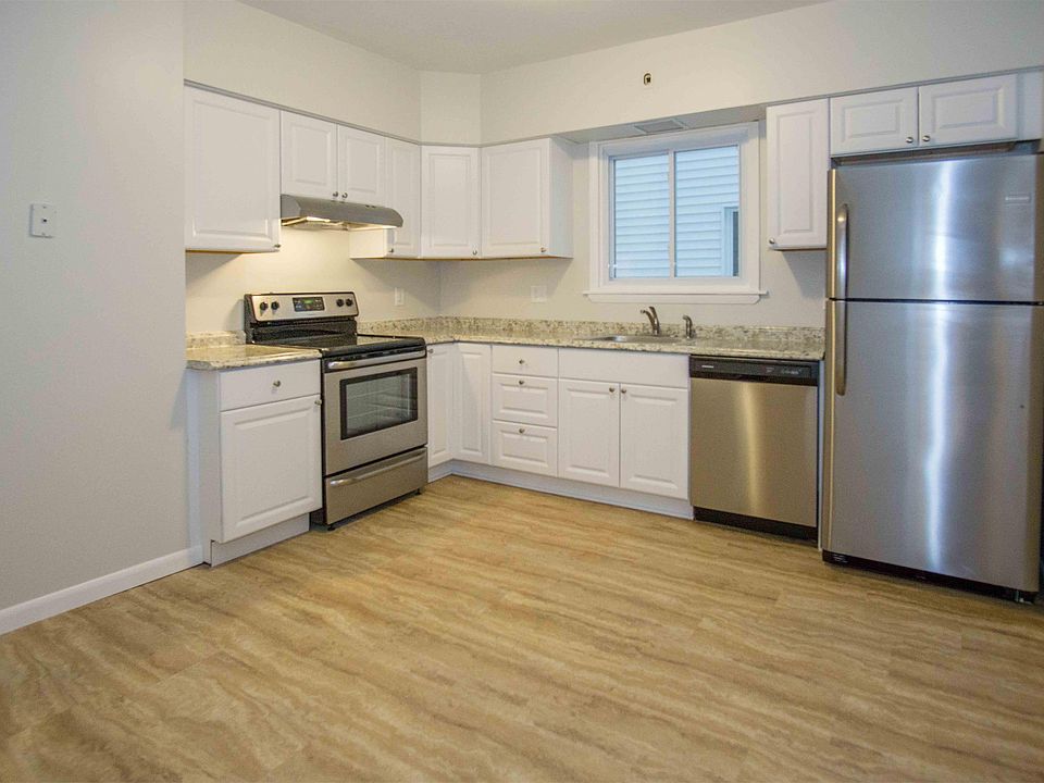Large kitchen with new cabinets, stainless appliances.