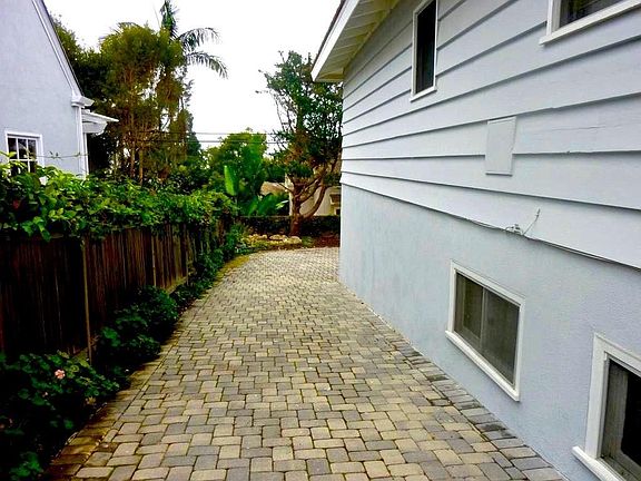 Side of House/Driveway to Backyard & Garage