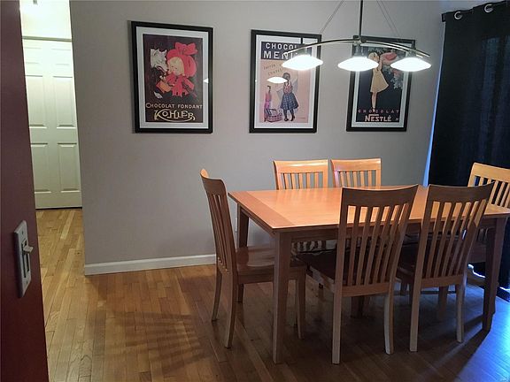 Separate dining area with sliding doors to backyard.