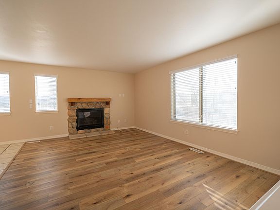 gas fireplace turned on by a light switch, warms the room!