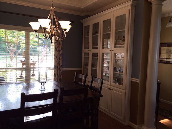 Fml dining w/ cabinetry 