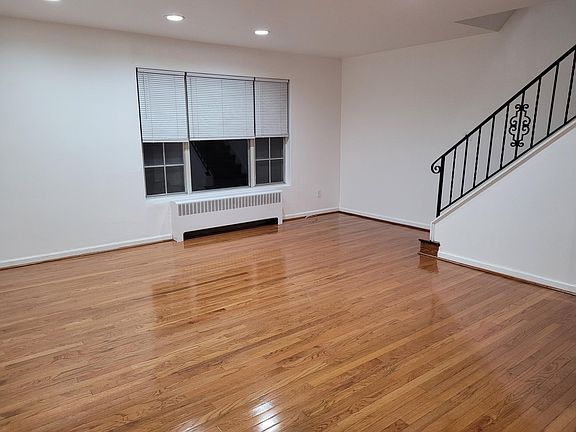 Living room with stairs to upper floor