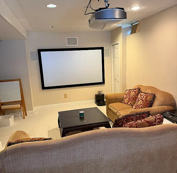 Basement media room (includes projector, screen, and surround sound wired in)