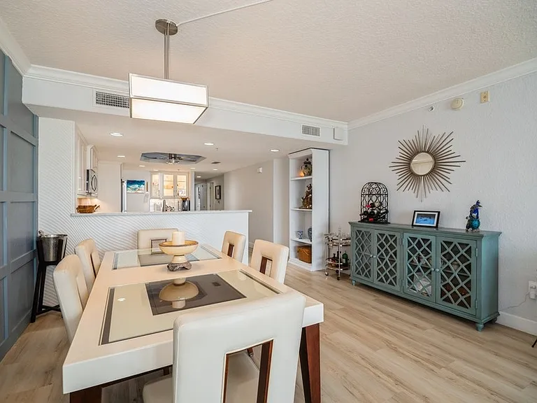 Kitchen is open to Dining and Living Room