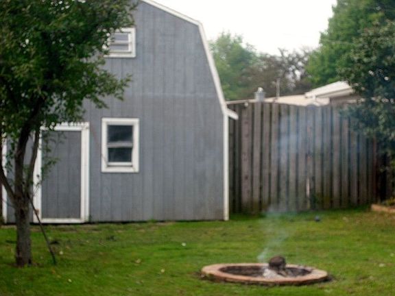 Back Yard & 2 Story Storage Barn