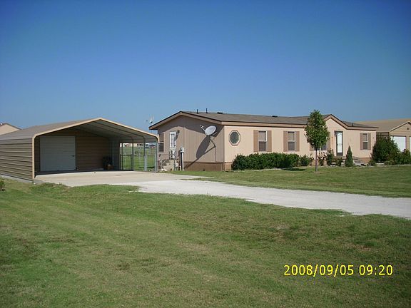 2 car carport with secure storage area