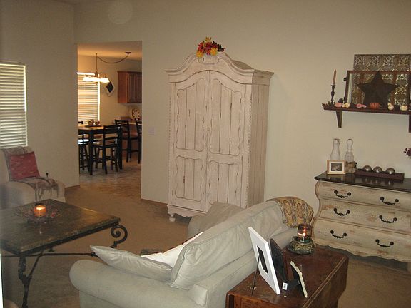 living room with view into dining area