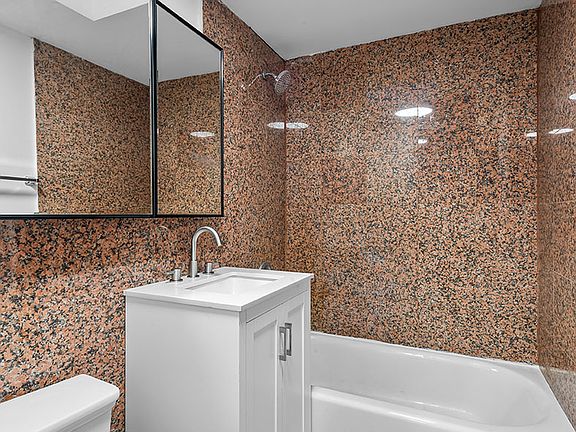 5th image of 150 E 3rd St APT 2E