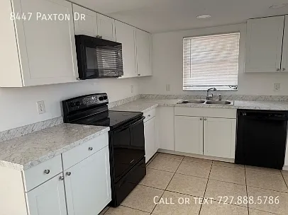 8447 Paxton Dr — Photo 47