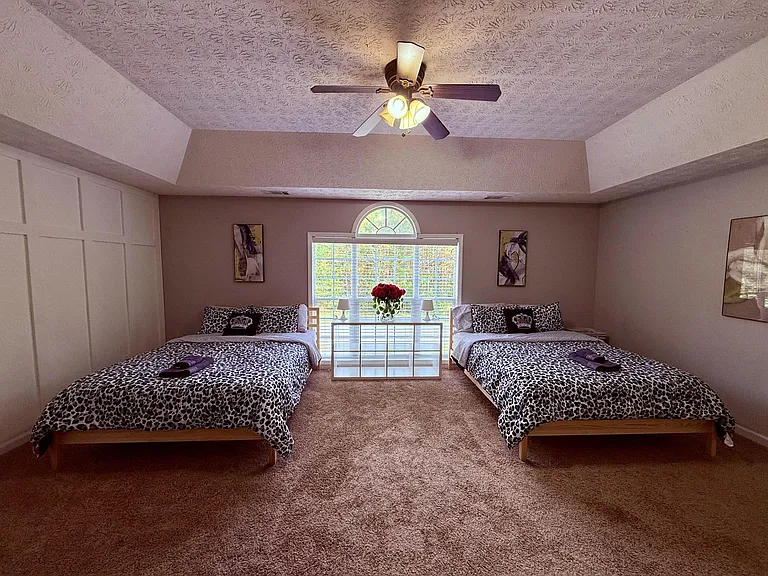Spacious second-floor bedroom primary suite with private bath