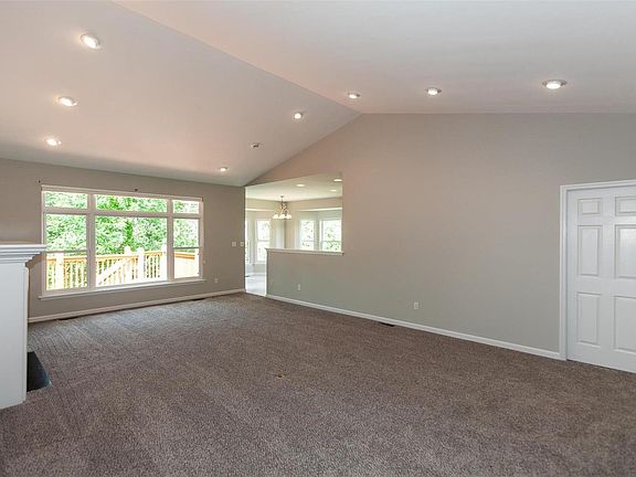 Great Room looking out onto the spacious deck and private backyard.